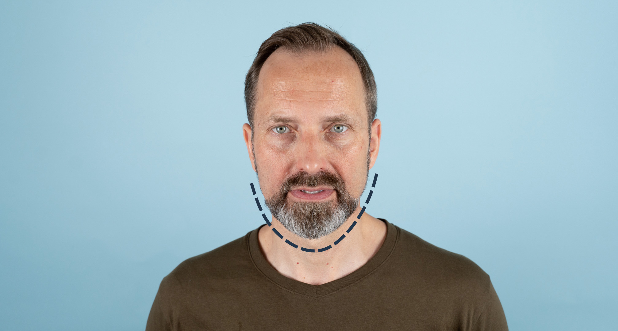 kontur wokół owalnego kształtu twarzy na niebieskim tle